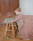 baby with sticker book