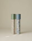 Two mushie Kaleidoscopes, green and blue floral, ideal for creative play.