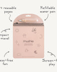 The mushie Reusable Water Color Pad in pink fairies includes a refillable water pen and features 4 reusable pages. It’s compact for travel, sustainable, mess-free, and supports screen-free play.