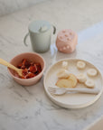Kids snack with mushie Dinnerware Fork and Spoon Set; dishwasher-safe and non-toxic plastic.