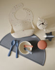 Mushie Silicone Baby Bib with adjustable neck strap, utensils, bowls & cup included.
