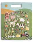 A reusable sticker set themed around farm animals and barnyard scenes, with various colorful stickers displayed on a green background, including animals like horses and cows, and elements like a windmill, tractor, and fence.
