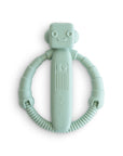 The mushie Robot Rattle Teether is a mint green silicone baby teething toy shaped like a robot, featuring a circular textured handle, a smiling face, and simple embossed designs—perfect for soothing little gums.
