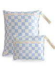 The mushie Water Resistant Wet Bag in Blue Check features two zippered pouches with beige straps—perfect for organizing essentials or using as a diaper bag storage solution on the go.