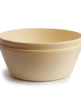 The mushie Round Dinnerware Bowl is a smooth, beige ceramic bowl displayed on a white background—an elegant upgrade from standard baby bowls and plastic dinnerware.