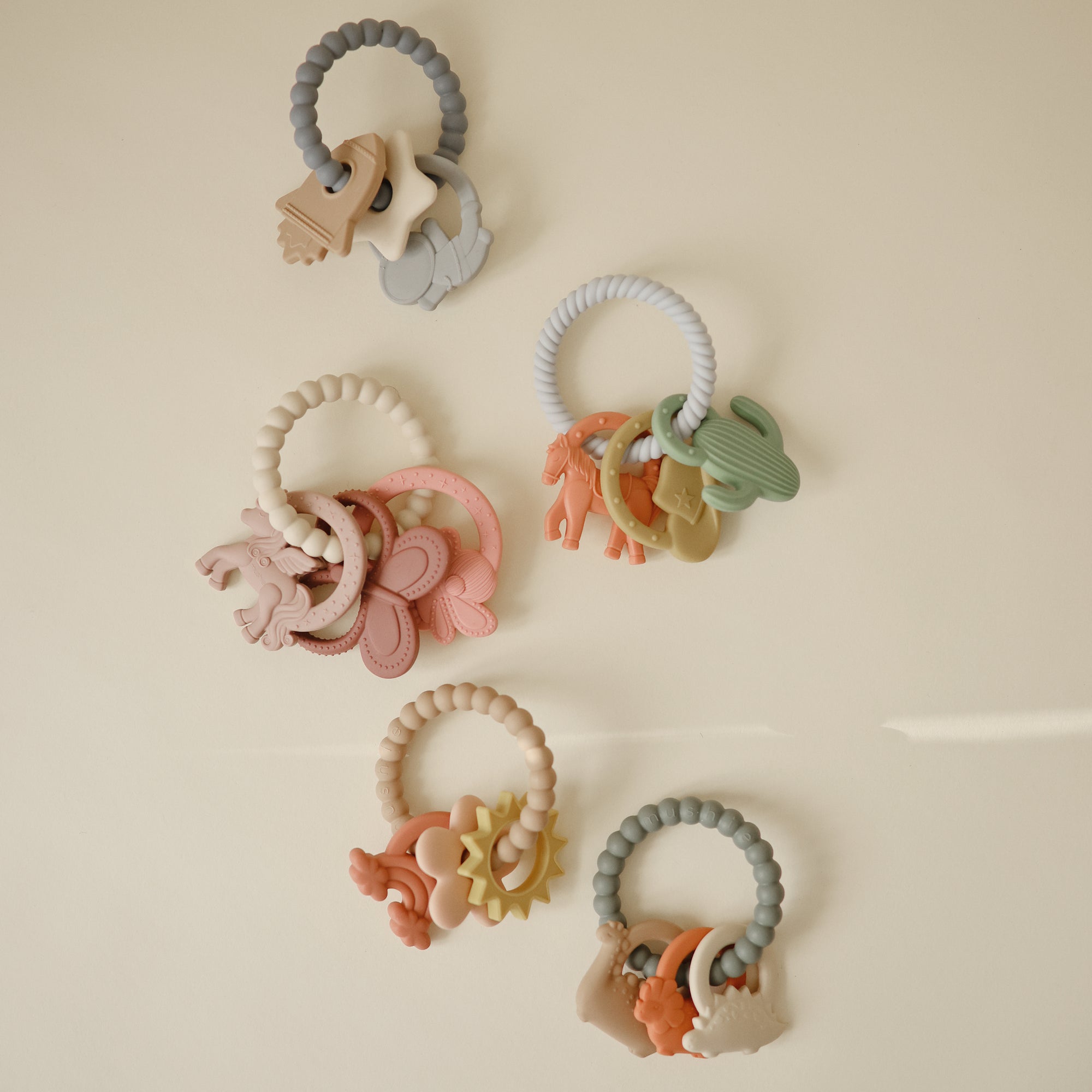 Mushie Fairy Teething Ring: a colorful, food-grade silicone teether for sensory baby fun.