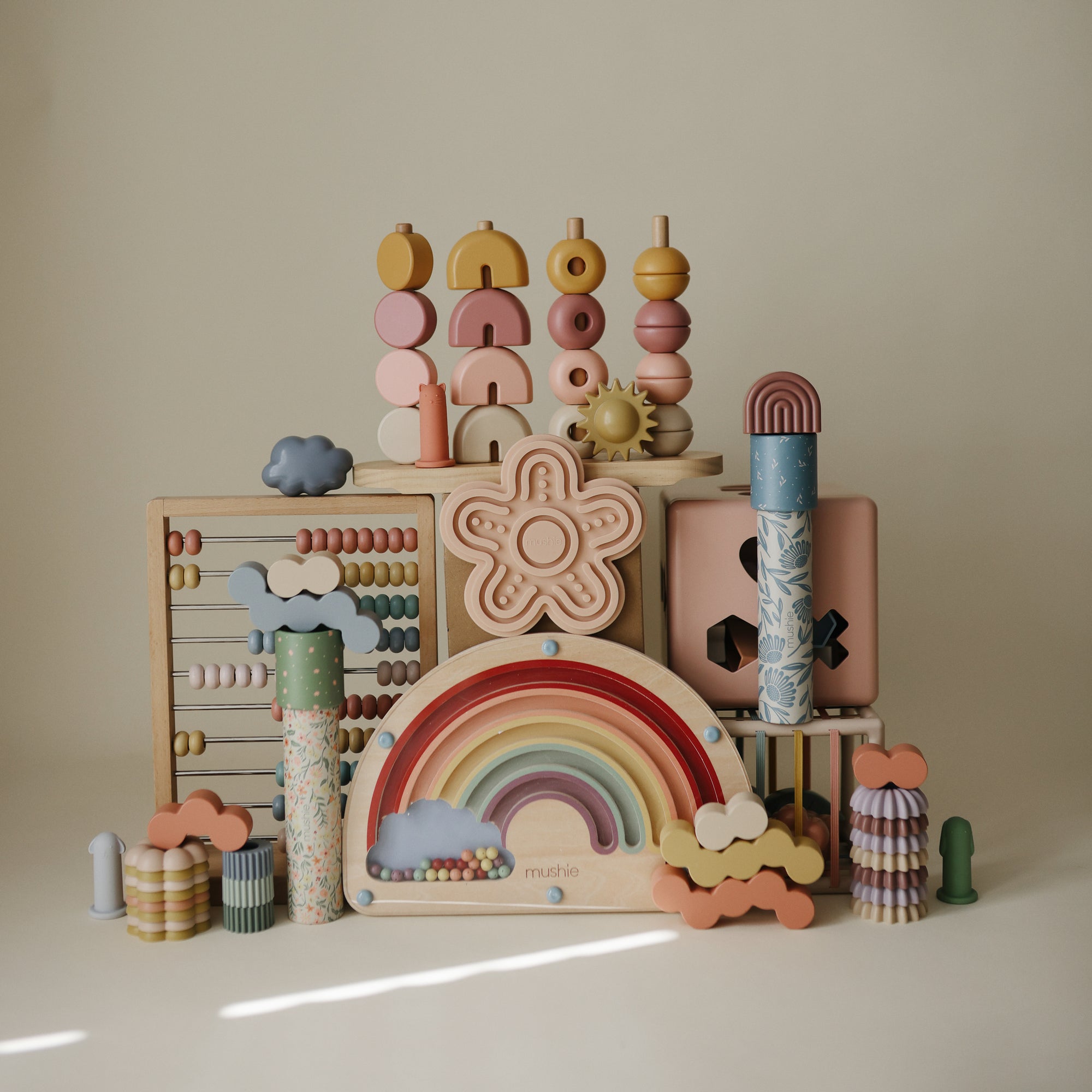 Mushie Kaleidoscopes: pastel wooden toys for imaginative play.