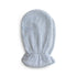 The Mushie Organic Cotton Bath Mitt is light gray, fluffy, and gentle on sensitive skin, featuring an elastic wrist. Shown on a white background.