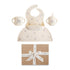 The mushie Bluey Gift Set includes a bib, two-handled cups, and a placemat with pastel animal and star patterns. The silicone baby mealtime set comes in a brown gift box tied with a white ribbon.