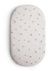 Mushie Extra Soft Bassinet Muslin Crib Sheet in Boats print with tiny brown and gray design.