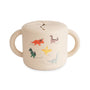 The mushie Snack Cup in Dinosaurs features a spill-proof lid, two handles, and colorful cartoon dinosaurs with dotted footprints. A perfect toddler snack container!.