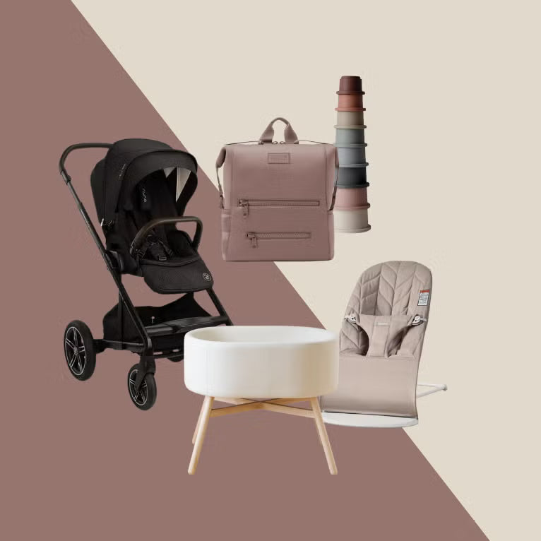 A curated collection of baby and parenting products on a split beige and dusty mauve background: a black stroller, a dusty pink backpack, a stack of six colorful baby bottles, a white round ottoman with wooden legs, and a beige infant car seat.