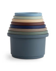 Mushie Stacking Cups Toy: classic nesting cups in muted colors, inspired by Danish Hygge style.
