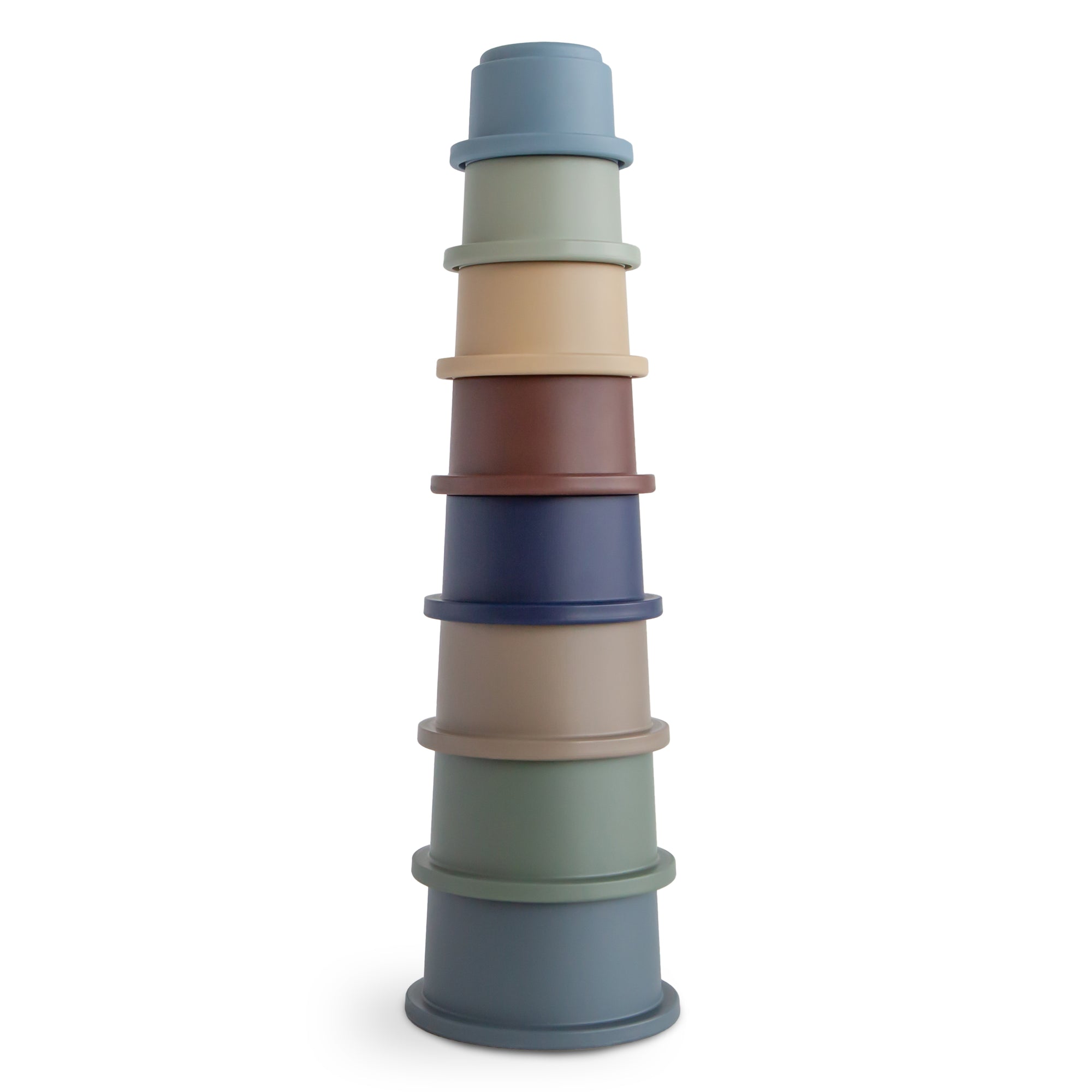 Eight colorful mushie Stacking Cups Toy inspired by Danish Hygge, perfect for stacking fun.