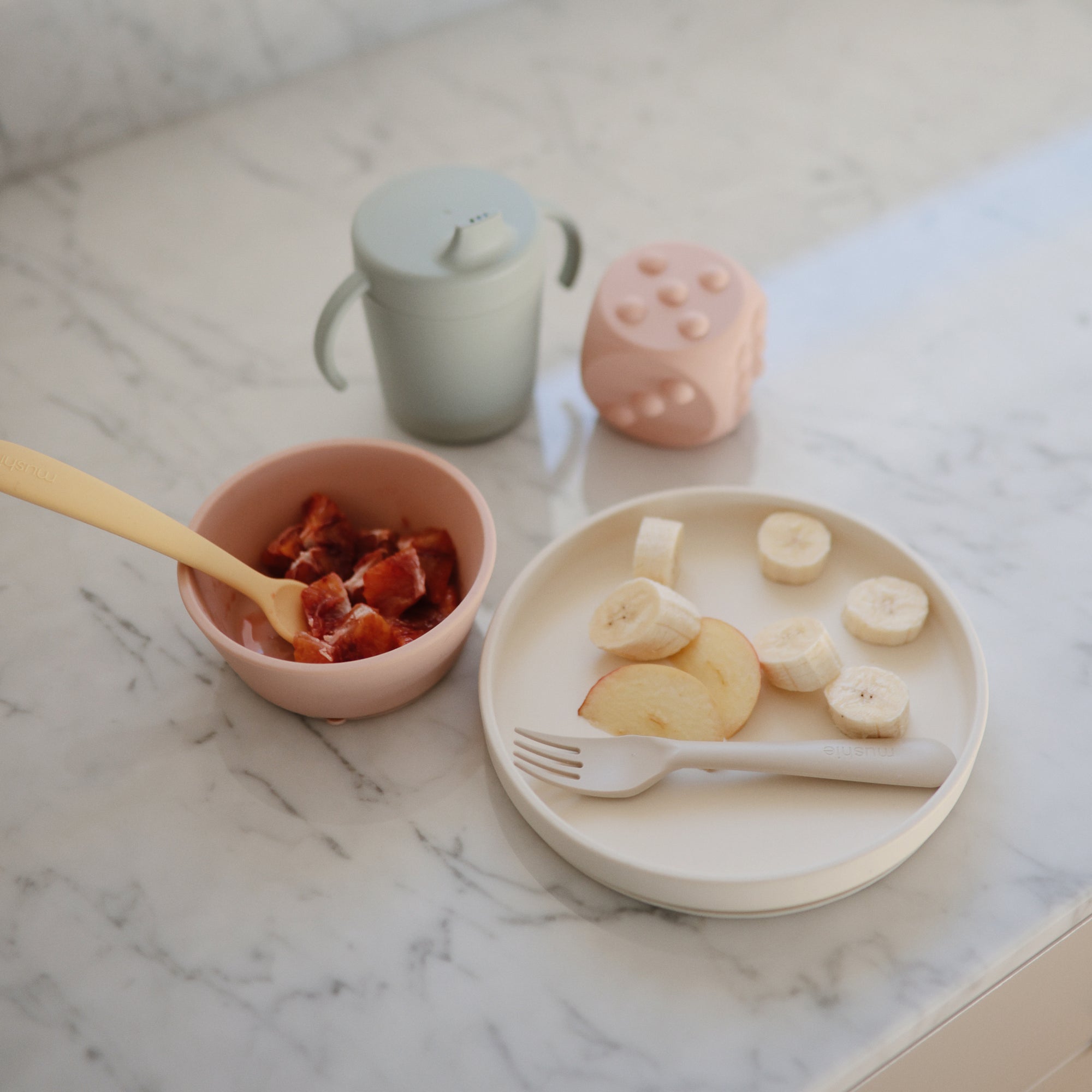 Kids snack with mushie Dinnerware Fork and Spoon Set; dishwasher-safe and non-toxic plastic.
