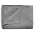 The mushie Knitted Ribbed Baby Blanket, in light gray with a textured organic knit pattern, is neatly folded on a white background. One corner is flipped, showing the reverse side.