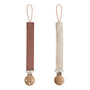 Mushie Linen Pacifier Clip 2-Pack: brown & beige clips with wooden clasps on white background.