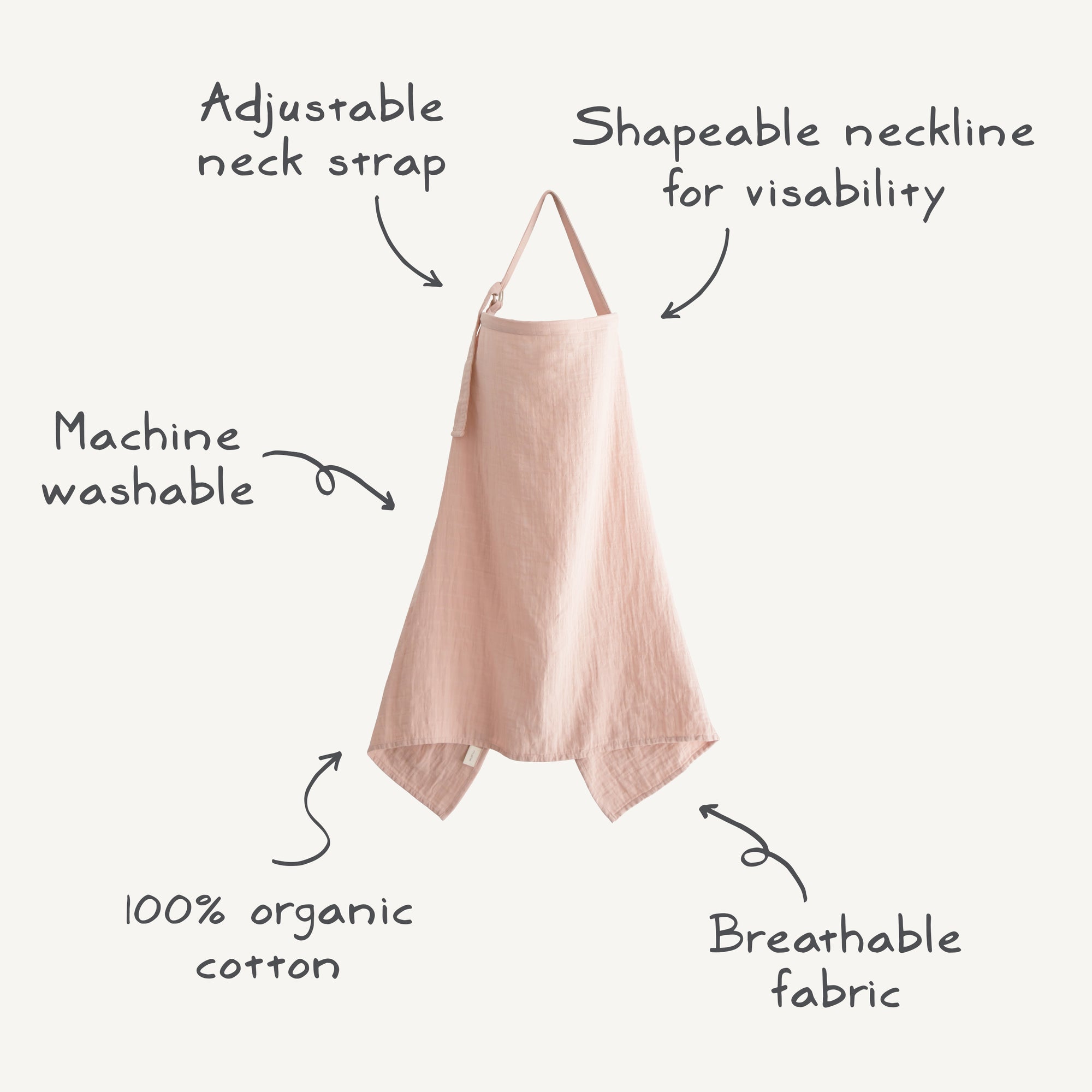 The mushie Muslin Nursing Cover in light pink is made from 100% organic cotton, doubles as a breathable apron, and features a shapeable neckline, adjustable neck strap, pointed hem, and is machine washable.