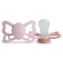 The FRIGG Butterfly Anatomical Silicone Pacifier 2-Pack (6-18 Months) in Pretty in Peach/Primrose is shown, with one pacifier facing forward to display the butterfly-shaped shield and the other on its side, revealing the anatomical nipple.