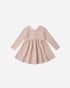 Rylee + Cru Ribbed Long Sleeve Dress in Dusty Rose Microstripe, flared on white background.