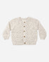 Rylee + Cru Bubble Knit Cardigan Natural Confetti, cream with brown buttons, laid flat on white.
