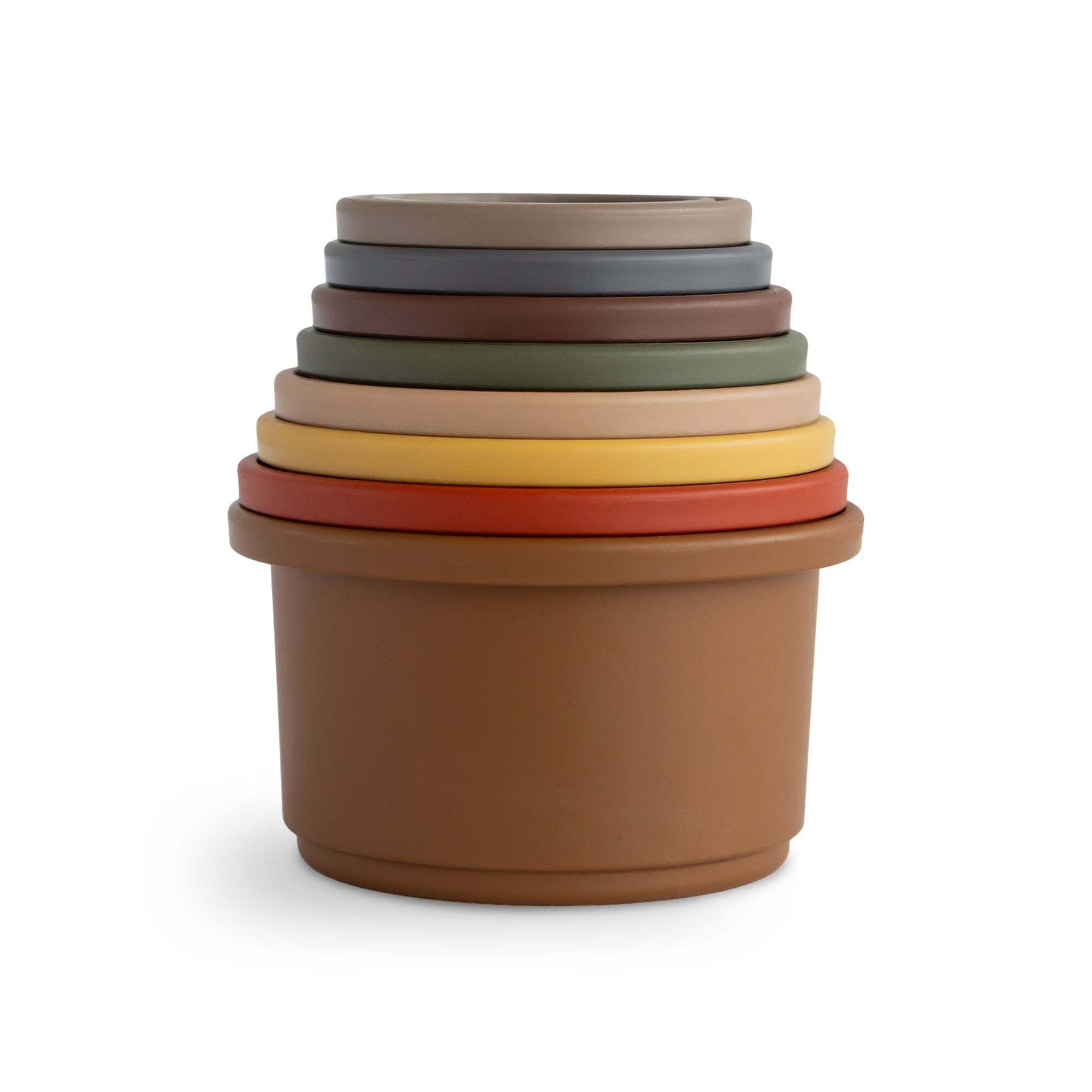 Mushie Stacking Cups Toy: seven stacked cups evoke Hygge, a cozy baby toy on white background.