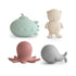 The mushie Sealife Mold Free Bath Play Set includes four silicone toys—a mint green submarine, cream diver bear, pink octopus, and gray whale—with modern designs for safe, mold-free bath fun. Shown on a white background.