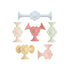 Six mushie Daisy Silicone Suction Builders in pastel blue, cream, pink, green, yellow, and peach are arranged on a white background. These flower-shaped toys encourage motor skill development and make perfect bath toys.