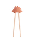Mushie Training Chopsticks in Rose with dino topper, perfect for learning to use chopsticks.