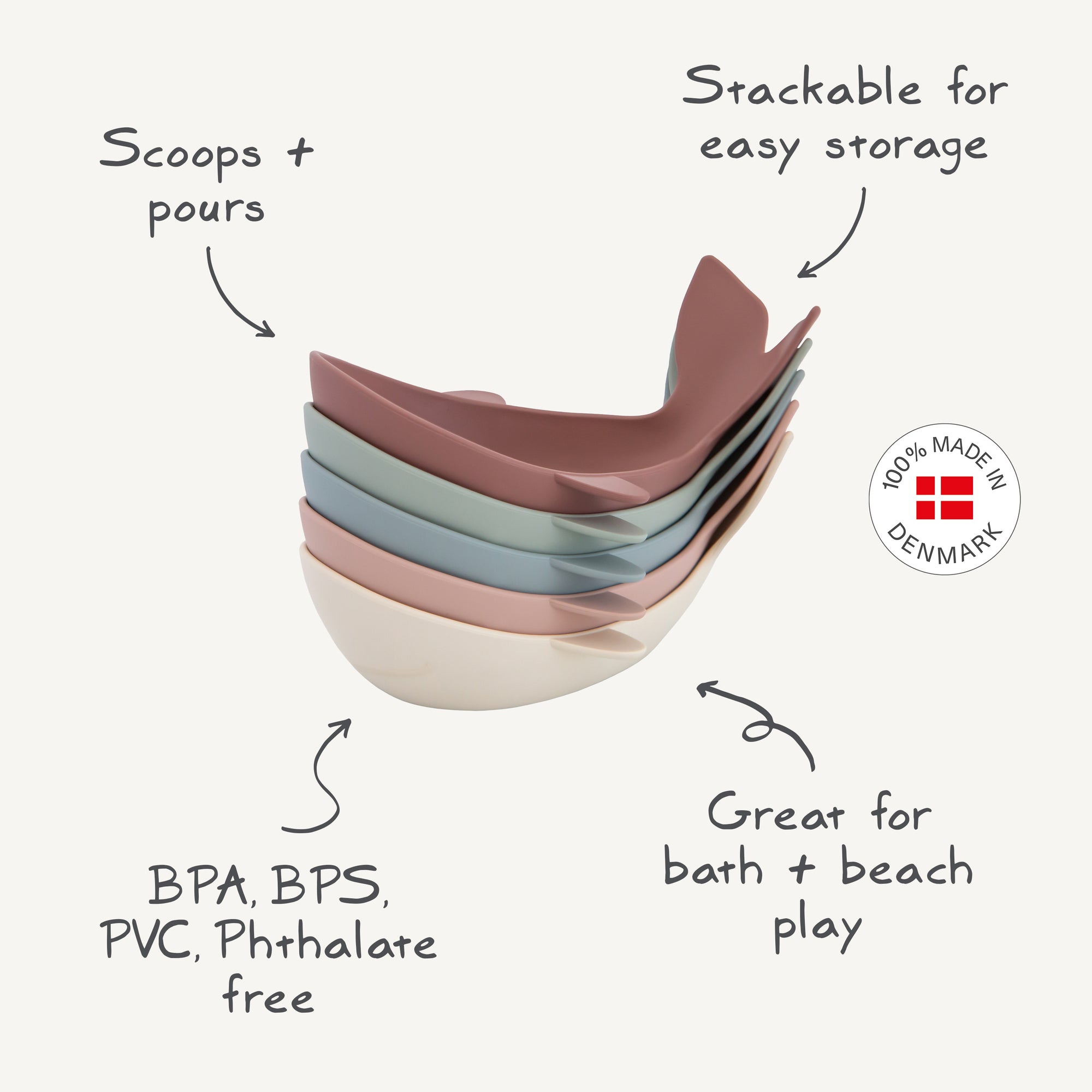 Mushie Whale Bath Stackers feature pastel colors and a "Made in Denmark" seal.