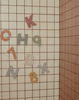Make bath time fun with mushie’s Letters & Numbers Bath Play Set for colorful learning.
