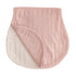 The mushie Organic Cotton Muslin Burp Cloth 2-Pack features soft, oval-shaped cloths in light pink and off-white, with visible edge stitching and a subtle textured pattern. Shown partially folded to display both sides.