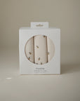 Mushie Changing Pad Liners—set of 3 organic cotton muslin liners with a small bee pattern.