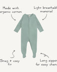 Mushie Zipper Pajama: light green organic cotton, long sleeves, zipper, and feature details.