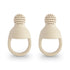 Two Mushie Silicone Fresh Food Feeders in beige, made from food-grade silicone with perforated tops and ring handles, are placed side by side on a white background—ideal for self-feeding.