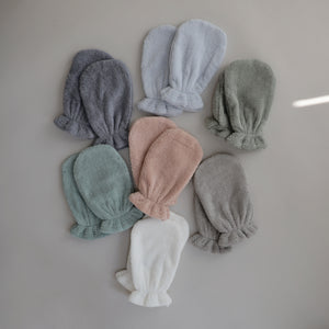 Lifestyle flatly of the Bath Mitt collection