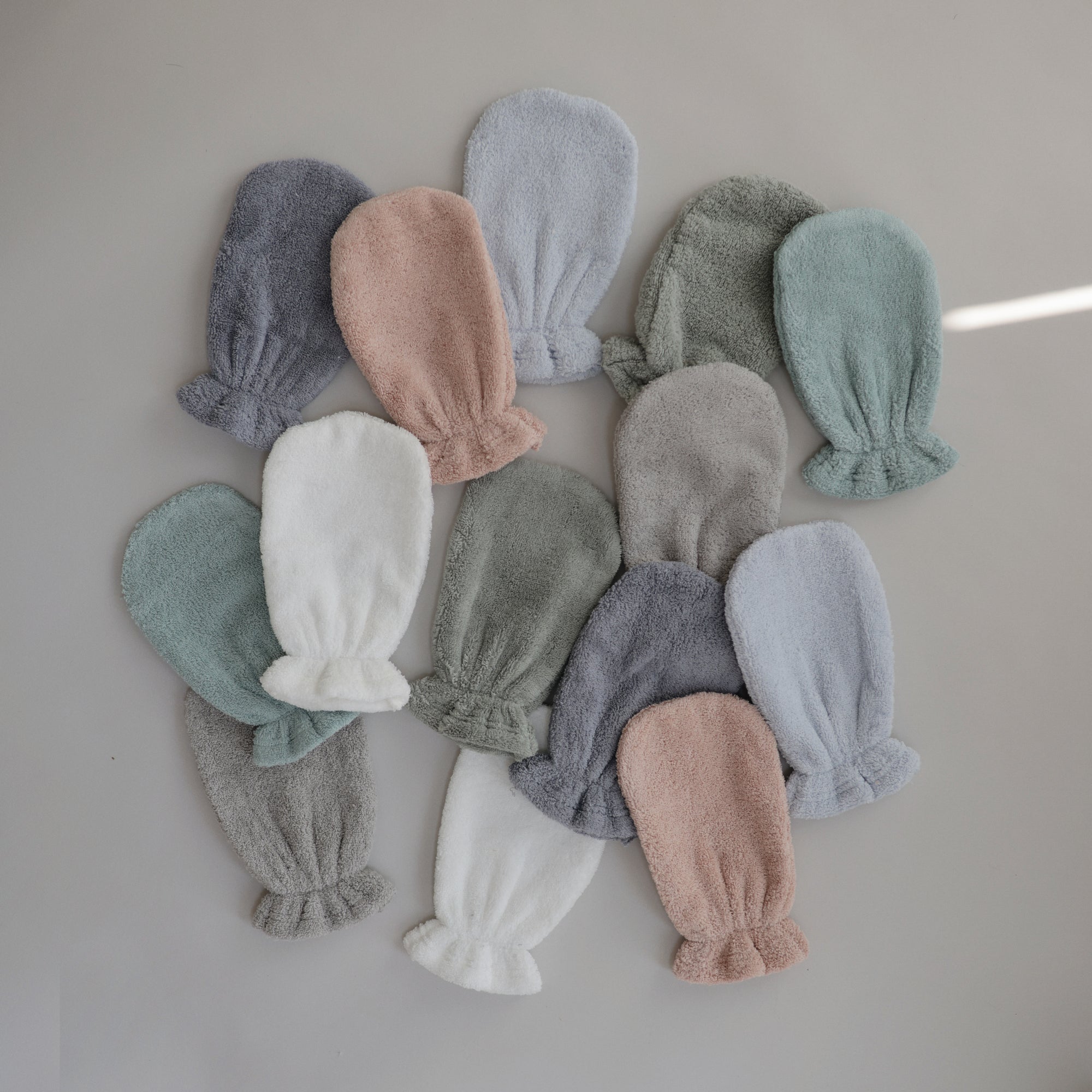 Lifestyle flatly of the Bath Mitt collection